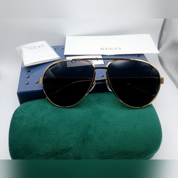 Gucci gold frame sunglasses. Model # GG1513S - Picture 1 of 9